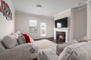 Cozy living room with fireplace in a Triad NC home for sale